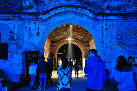 BONTIDA - JUNE 22  Crowd of partying people during a live concert at Electric Castle Festival on June 22, 2014 in the Banffy castle in Bontida, Romaniaのeditorial素材