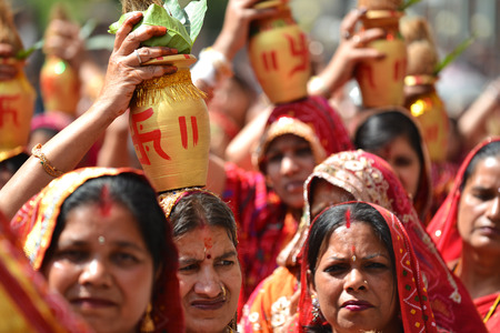KATHMANDU, NEPAL - OCTOBER 11: Crowd of Hindu people celebrating the first day of the Dasain festival on the streets of Kathmandu. On October 11, 2013 in Kathmandu, Nepalのeditorial素材
