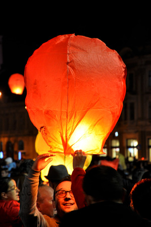CLUJ NAPOCA, ROMANIA - NOVEMBER 8: Romanians celebrate King Michael\'s name day, with thousands of air balloons released at night, as a sign of respect for his Majesty. On Nov. 8, 2014 in Cluj, Romaniaのeditorial素材