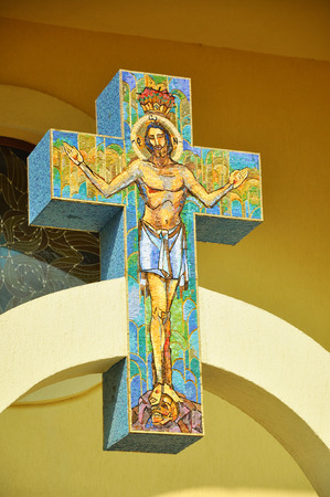 CLUJ - SEPTEMBER 14: Jesus on the cross, made from mosaic in the newly built Greek Catholic Church. On September 14, 2011 in Cluj-Napoca, Romaniaのeditorial素材