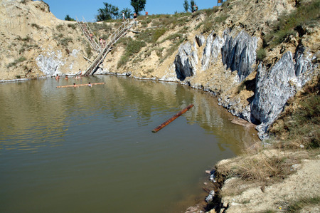 OCNA SIBIULUI, ROMANIA - JULY 9: Unidentified people swimming and floating on the water of the abandoned salt mine. On July 9, 2005 in Ocna Sibiului (Vizakna, Salzburg), Romaniaのeditorial素材