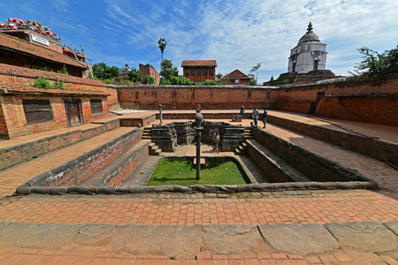 BHAKTAPUR  OCTOBER 10: Ancient fountain in the Unesco heritage site of Bhaktapur now destroyed by the earthquake that hit Nepal on April 25 2015. On Oct. 10 2013 in Bhaktapur Nepalのeditorial素材
