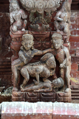 KATHMANDU  SEPTEMBER 29: Erotic carvings on a Hindu temple now destroyed after the massive earthquake that hit Nepal on April 25 2015. On September 29 2013 in Kathmandu Nepalのeditorial素材