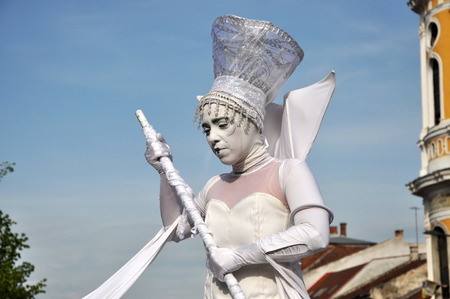 CLUJ NAPOCA  MAY 24: Parola Bianca theater group performing street theater on stilts inside the Man.In.Fest during the Cluj Days of Cluj. On May 24 2015 in in Cluj Romaniaのeditorial素材
