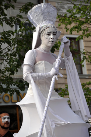 CLUJ NAPOCA  MAY 24: Parola Bianca theater group performing street theater on stilts inside the Man.In.Fest during the Cluj Days of Cluj. On May 24 2015 in in Cluj Romaniaのeditorial素材