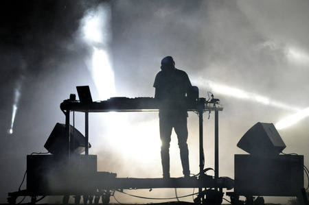 BONTIDA - JUNE 26, 2015: Fatboy Slim aka Norman Cook performs live at the main stage of the Electric Castle Festival at June 26, 2015 in the Banffy castle in Bontida, Romaniaのeditorial素材