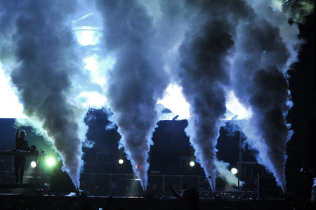 BONTIDA - JUNE 26, 2015: Fatboy Slim aka Norman Cook performs live at the main stage of the Electric Castle Festival at June 26, 2015 in the Banffy castle in Bontida, Romaniaのeditorial素材