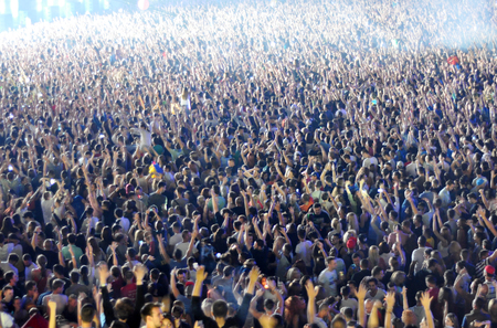 CLUJ NAPOCA, ROMANIA  JULY 30, 2015: Party people having fun during a Dimitri Vegas and Like Mike...