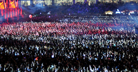 CLUJ NAPOCA, ROMANIA  JULY 30, 2015: Crowd of partying people enjoy a Dimitri Vegas and Like Mike...
