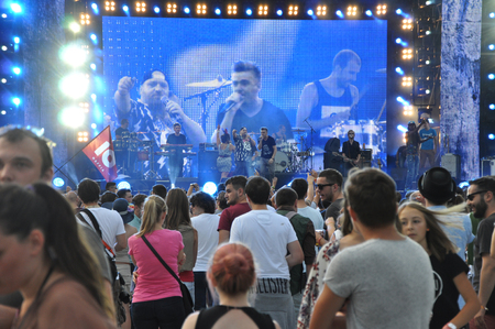 CLUJ NAPOCA, ROMANIA  AUGUST 2, 2015: Crowd of partying people enjoy a Irish Maffia live concert at the Untold Festivalのeditorial素材