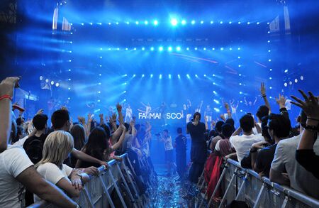 CLUJ NAPOCA, ROMANIA  AUGUST 2, 2015: Crowd of party people having fun during a Fatman Scoop concert at the Untold Festivalのeditorial素材