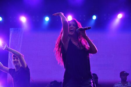 CLUJ NAPOCA, ROMANIA  AUGUST 2, 2015: Sexy girl dancing on the stage during a Fatman Scoop live concert at the Untold Festivalのeditorial素材
