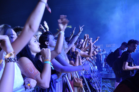 CLUJ NAPOCA, ROMANIA  JULY 30, 2015: Crowd of cheerful young people having fun during a live concert at Untold Festival in the European Youth Capital city of Cluj Napocaのeditorial素材