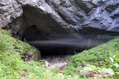 Mist in a cave entranceの写真素材