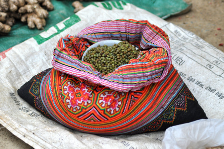 SAPA, VIETNAM - FEBRUARY 23, 2013: A bag full with dried peas on sale in the rural mountain market of Sapa, Vietnamのeditorial素材