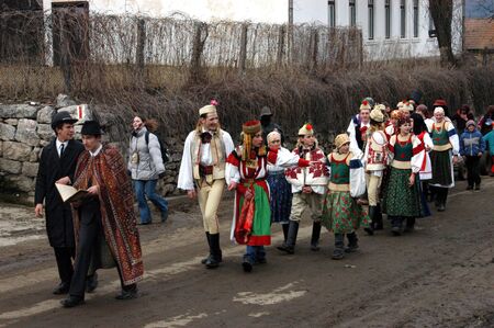 RIMETEA - FEBRUARY 28: Unidentified people of Torocko village attending the carnival show, the...