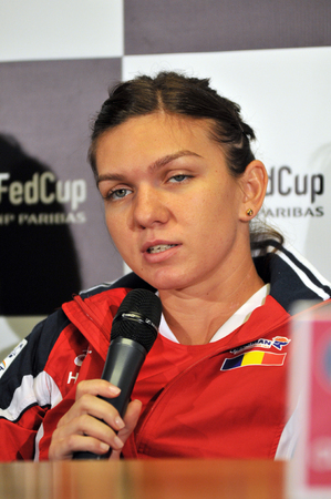 CLUJ-NAPOCA, ROMANIA - APRIL 13, 2016: Romanian tennis player Simona Halep answering questions during the press conference before Tennis Fed Cup by BNP Paribas World Cup Play-Offs match Romania vs Germanyのeditorial素材