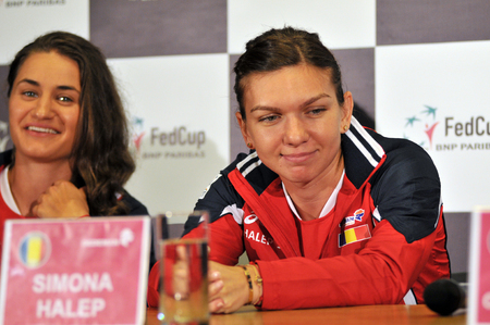 CLUJ-NAPOCA, ROMANIA - APRIL 13, 2016: Tennis players Simona Halep and Monica Niculescu answering questions during the press conference before Tennis Fed Cup by BNP Paribas World Cup Play-Offs match Romania vs Germanyのeditorial素材