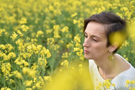 Portrait of a young hipster girl in the natureの写真素材