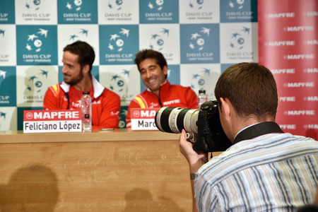 CLUJ-NAPOCA, ROMANIA - JULY 12, 2016: Photo reporters photographing during the press conference before Davis Cup by BNP Paribas match Romania vs Spainのeditorial素材