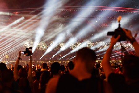 CLUJ-NAPOCA, ROMANIA - AUGUST 7, 2016: Large crowd of people, audience partying in the front of the Main Stage at a Armin van Buuren concert at Untold Festivalのeditorial素材