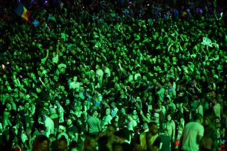CLUJ-NAPOCA, ROMANIA - AUGUST 4, 2016: Stadium full with cheering crowd partying at a Faithless concert during the Untold Festivalのeditorial素材