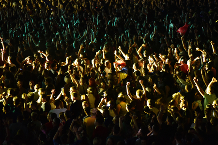 CLUJ-NAPOCA, ROMANIA - AUGUST 4, 2016: Stadium full with cheering crowd partying at a Faithless...