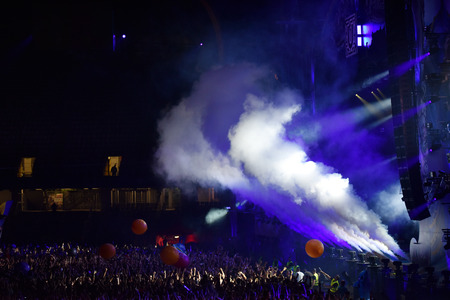 CLUJ NAPOCA, ROMANIA - AUGUST 4, 2016: CO2 smoke cannons emitting smoke on the stage onto crowd at a Dj Nervo concert during Untold Festivalのeditorial素材