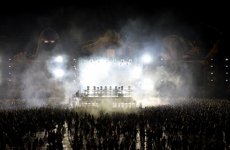 CLUJ NAPOCA, ROMANIA - AUGUST 5, 2016: Crowd of people, audience partying in the front of the stage at a Dannic live mixing concert at Untold festivalのeditorial素材
