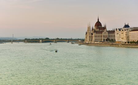 Budapest parliament at sunset near the Danube riverの写真素材