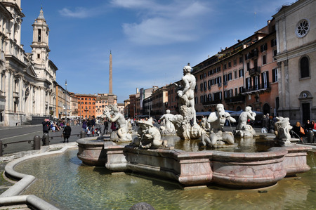 ROME, ITALY - MARCH 13, 2016: Tourists visiting Piazza Navona. With the Four River statue, the Egyptian obelisk and medieval architecture is one of the major tourist attractions in Romeのeditorial素材