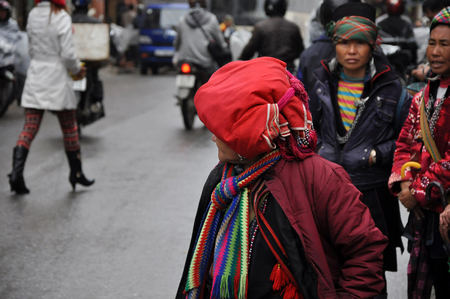 SA PA, VIETNAM - FEBRUARY 22, 2013: Unidentified woman from the Red Dao Minority group with a turban. Red Dao Minority are the 9th largest ethnic group in Vietnamのeditorial素材