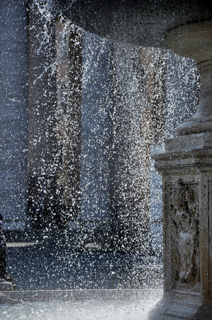 VATICAN CITY - MARCH 13, 2016: The fountains in the Saint Peter square are made by Carlo Maderno and Lorenzo Bernini and are one of major tourist attractionsのeditorial素材