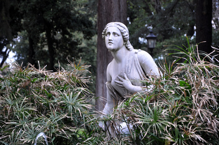 Statue of woman in Villa Borghese gardens. Rome, Italy