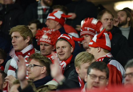 CLUJ NAPOCA, ROMANIA - MARCH 26, 2017: Cheerful fans of Denmark supporting their National Footbal Team against Romania during a Fifa World Cup Qualifiers matchのeditorial素材