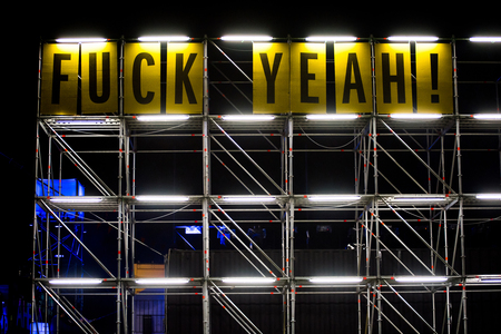 BONTIDA, ROMANIA - JULY 16, 2017: On the main message board of the Electric Festival the messages were changed during the festival. Fuck yeah! wordsのeditorial素材