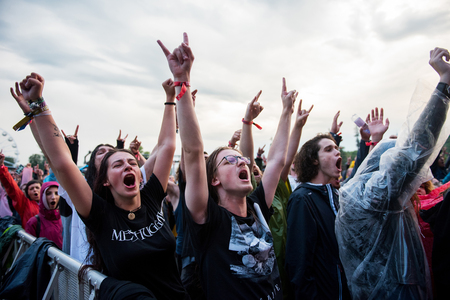 BONTIDA, ROMANIA - JULY  15, 2017: Crowd of hardcore fans headbanging during an Architects concert at Electric Castle festivalのeditorial素材