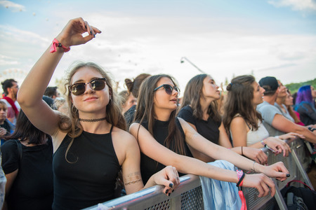BONTIDA, ROMANIA - JULY 16, 2017: Crowd of cheering people partying during a concert performed by Suie Paparude at Electric Castle festivalのeditorial素材