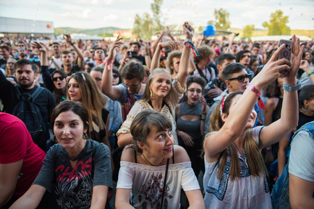 BONTIDA, ROMANIA - JULY 16, 2017: Crowd of cheering people partying during a concert performed by Suie Paparude at Electric Castle festivalのeditorial素材
