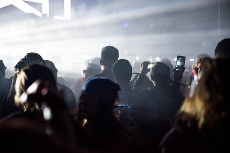 BONTIDA, ROMANIA - JULY 14, 2017: Crowd of people enjoying an electronic concert performed by Moderat band from Germany at Electric Castle festivalのeditorial素材