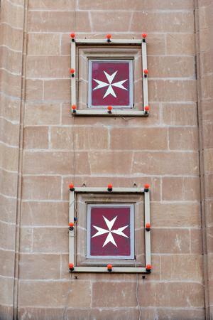 Maltese cross on a church. The cross symbol associated with the Order of St. John since 1567の写真素材