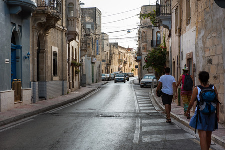 MOSTA, MALTA - AUGUST 21, 2017: The narrow streets with their colorful balconies of Mosta are one of the major tourist attractions of the cityのeditorial素材