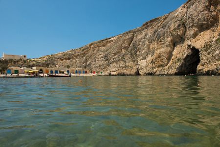 DWEJRA, MALTA - AUGUST 22, 2017: The Inland Sea (Qawra, Dwejra), is a lagoon of seawater on the island of Gozo linked to the Mediterranean Sea through an opening formed by a narrow natural archのeditorial素材