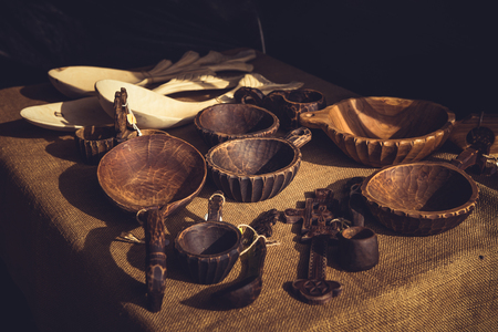 Handmade wooden bowls with handle and vintage spoonsの写真素材
