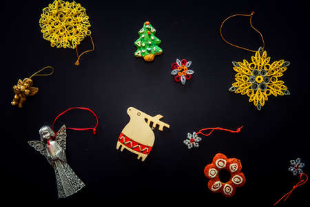 Collection of handmade Christmas ornaments on blackの写真素材