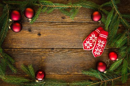 Wooden Christmas background with ornaments, space for textの写真素材