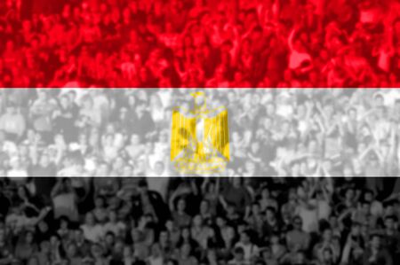 Crowd of football, soccer fans with raised arms with blending Egypt flagの写真素材