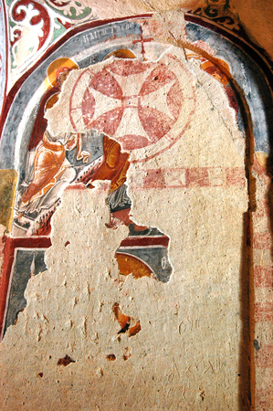 Layers of wall painting, fresco and mural in a cave chapel in Cappadocia, Central Anatolia, Turkeyのeditorial素材