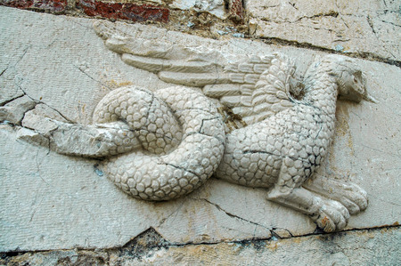 Relief of a dragon on the wall. St Nicholas Church. Mesopotam, Albaniaの写真素材