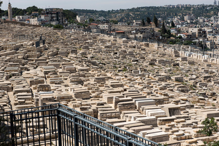 Graves in Mount of Olives Jewish Cemetery. Jerusalem, Israel. According to Jewish tradition, it is...
